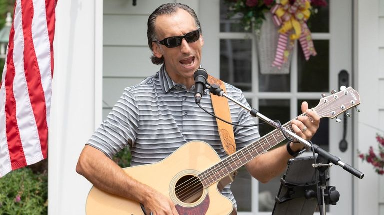 Brett Crompton of Floral Park rehearses with The