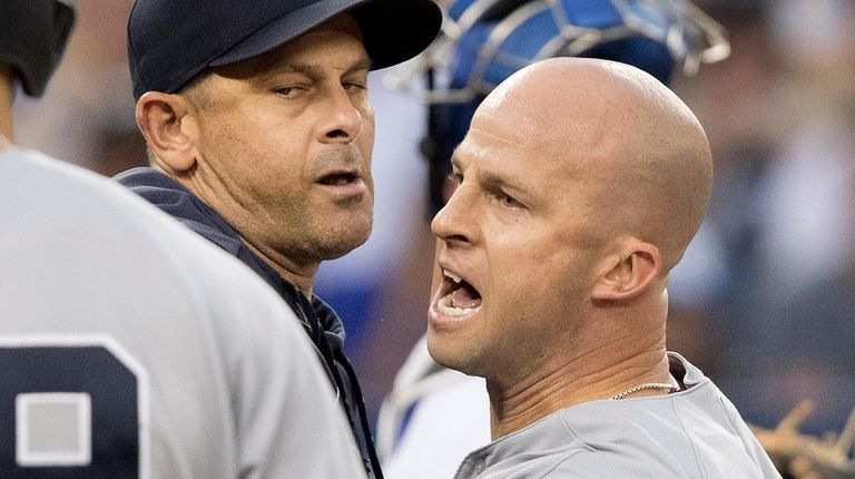 New York Yankees manager Aaron Boone holds Brett