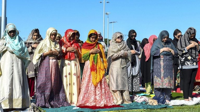 Members of a Selden mosque hold Eid al-Adha