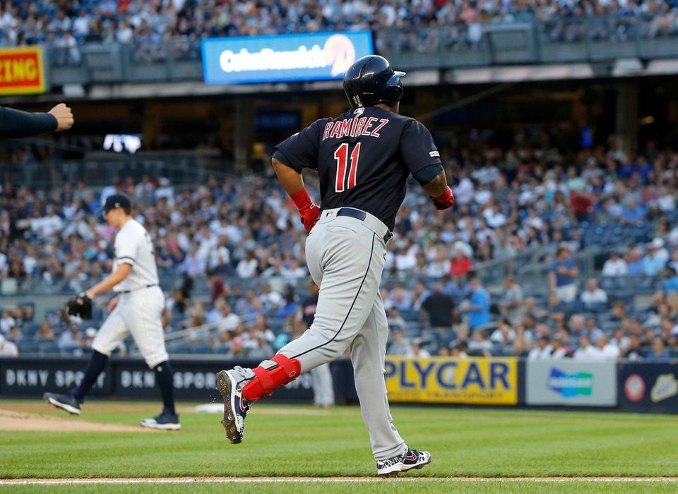 Jose Ramirez #11 of the Cleveland Indians runs
