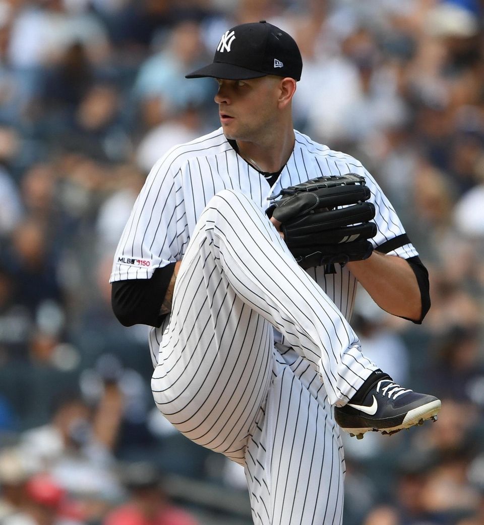 New York Yankees starting pitcher James Paxton delivers