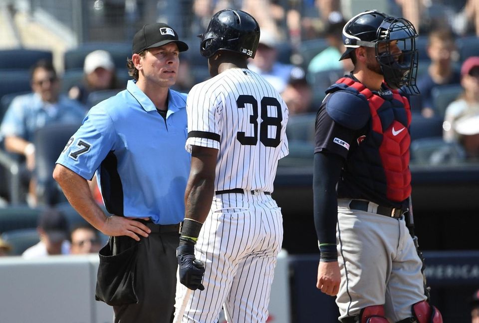 New York Yankees' Cameron Maybin questions home plate