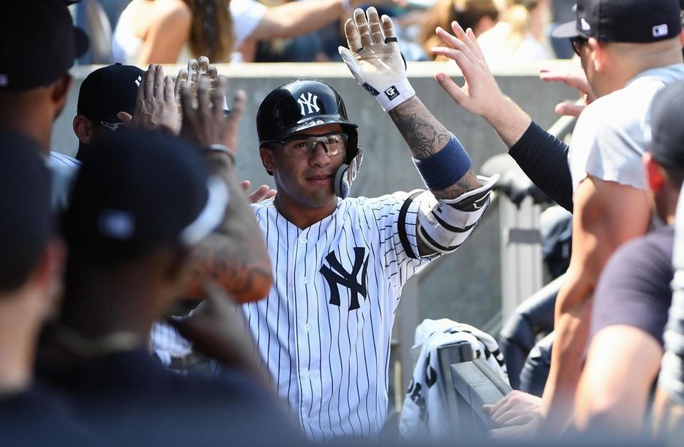 New York Yankees shortstop Gleyber Torres is greeted