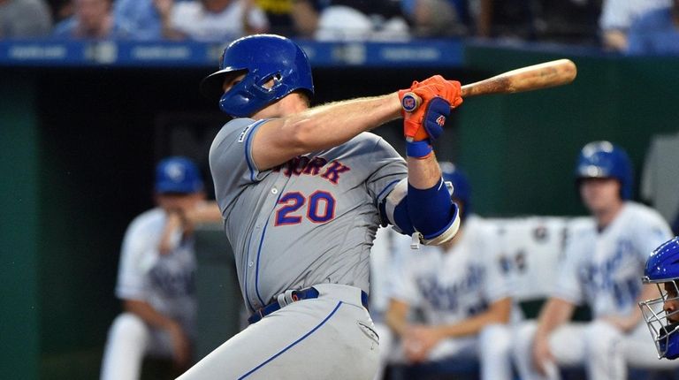 Pete Alonso #20 of the Mets hits a