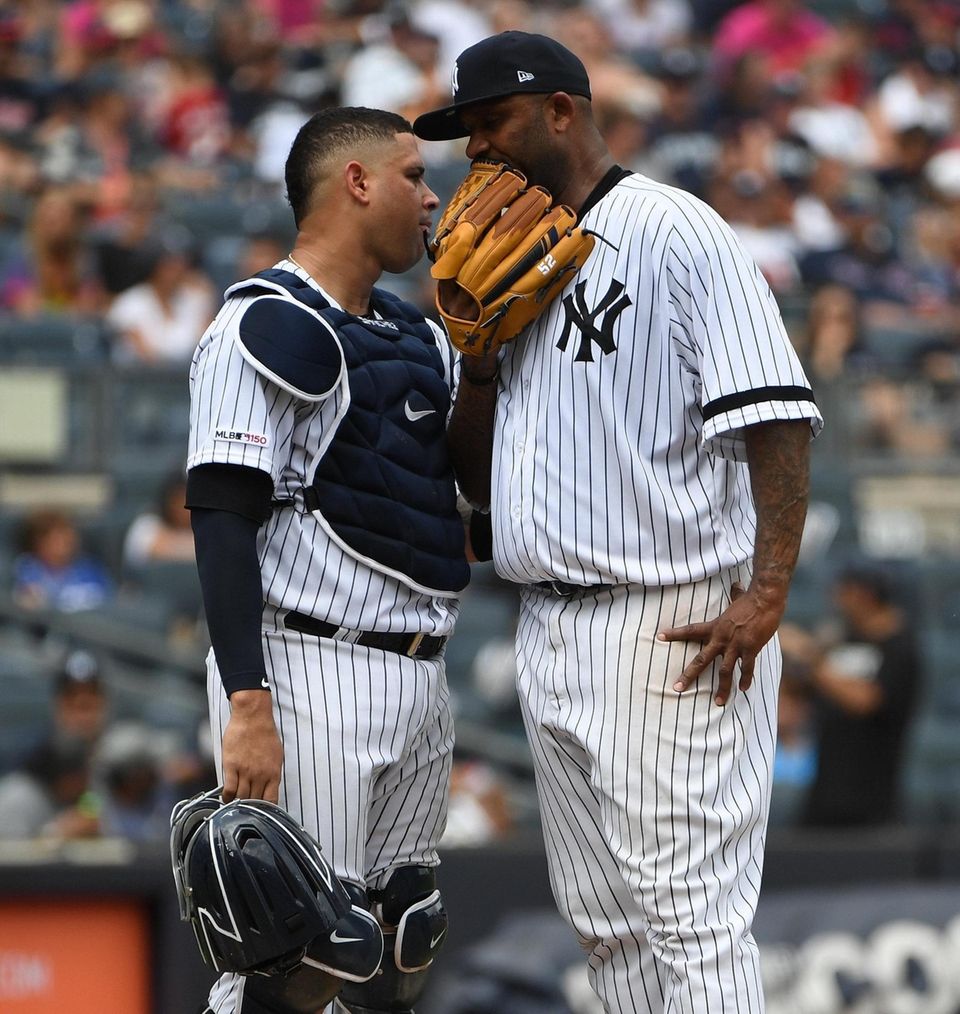 Yankees catcher Gary Sanchez talks to starting pitcher