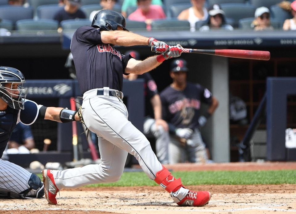 Cleveland Indians' Mike Freeman hits a three-run home