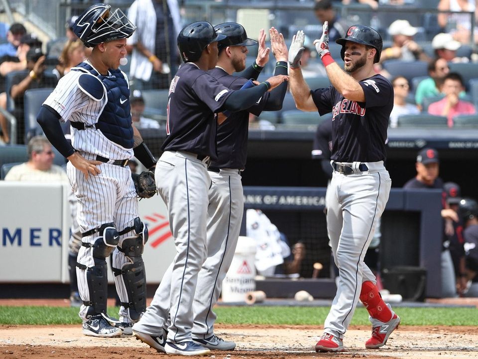 Cleveland Indians' Mike Freeman is greeted by Roberto