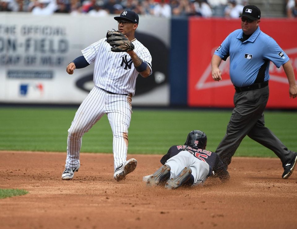 Cleveland Indians' Oscar Mercado steals second base as
