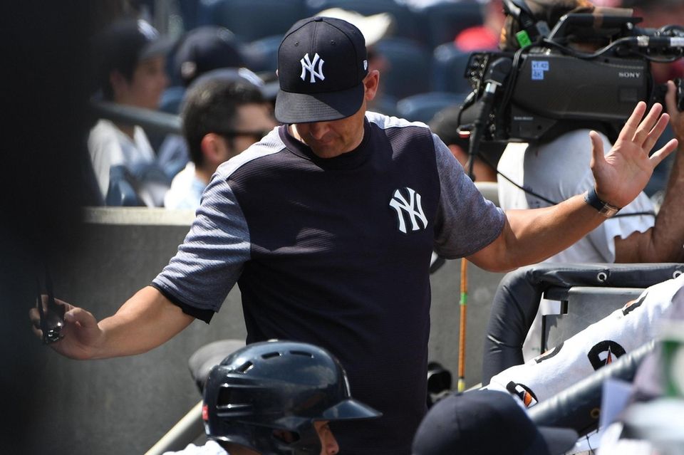 New York Yankees manager Aaron Boone reacts to