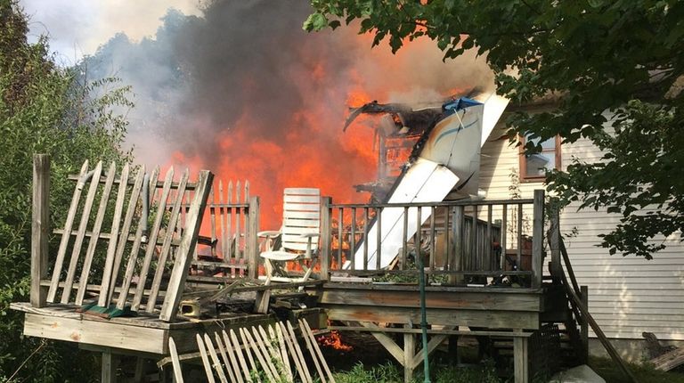 A Cessna 303 aircraft crashed into a house