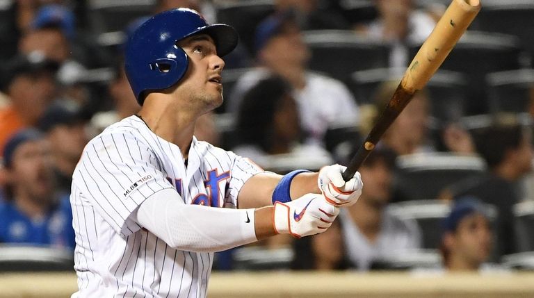 Mets rightfielder Michael Conforto watches the flight of
