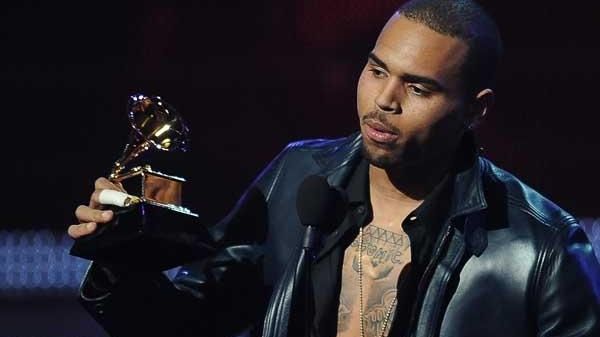 Chris Brown speaks after receiving his Grammy award