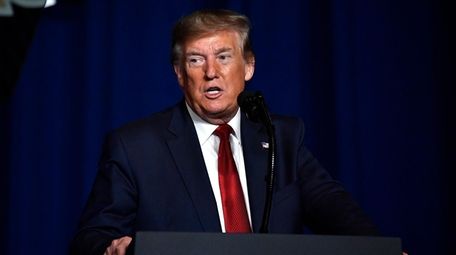 President Donald Trump speaks at the AMVETS National