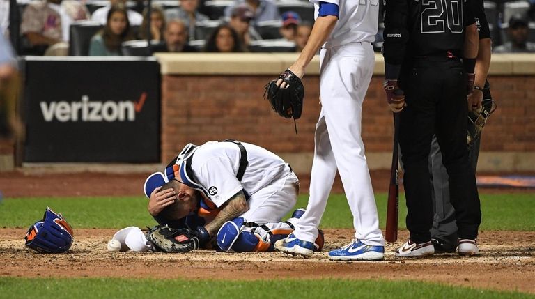 New York Mets catcher Tomas Nido reacts after