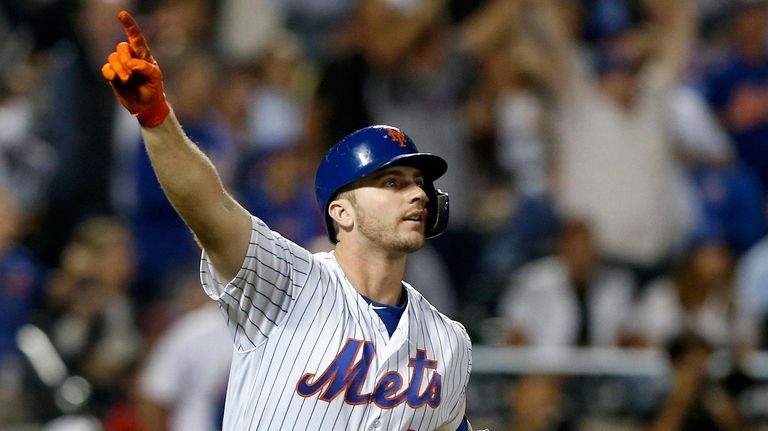 Pete Alonso #20 of the Mets reacts after