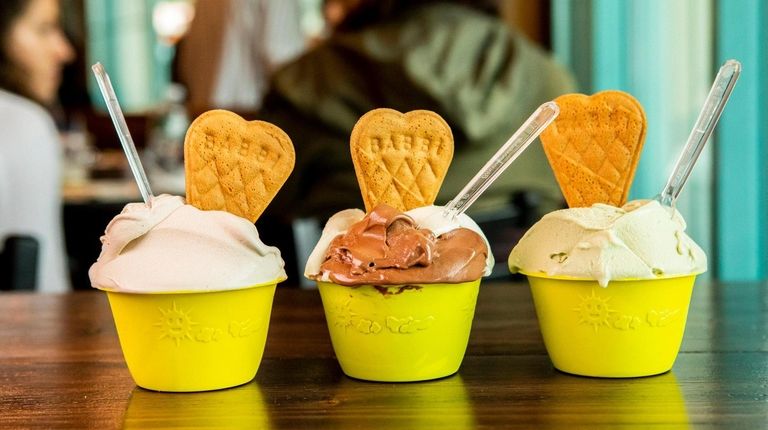 Hazelnut, vanilla and chocolate, and pistachio gelato at