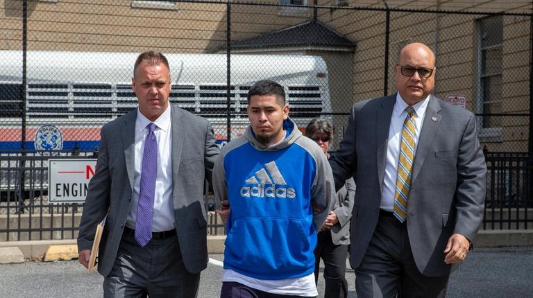 Raul Ponce leaves Nassau police headquarters in Mineola