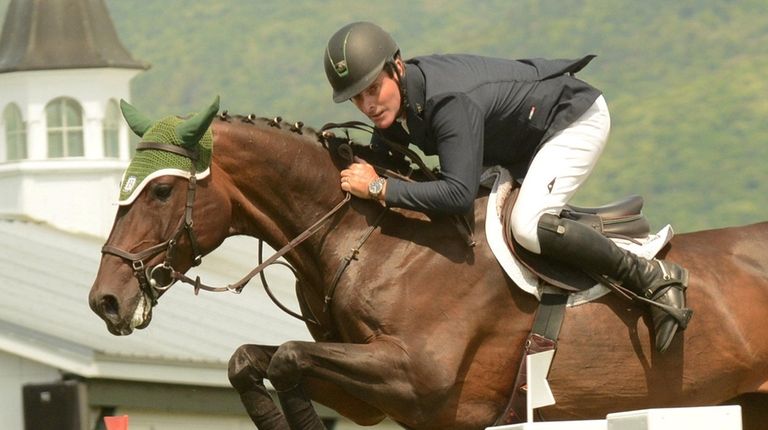 Shorapur and rider Kevin Babington compete at the