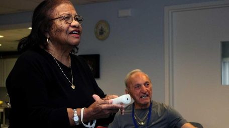 Central Islip resident Carrie Berry, 89, plays Wii