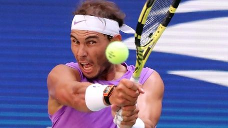 Rafael Nadal with the backhand return against Hyeon