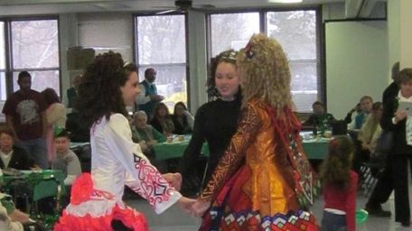 Irish dancers held hands while forming a circle