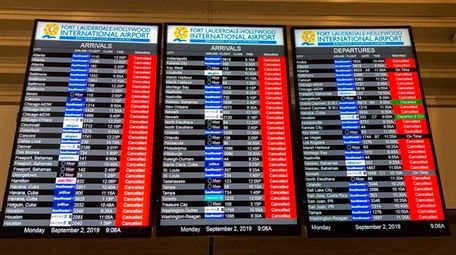 The information board displays all the canceled flights