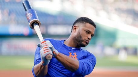 Mets second baseman Robinson Cano participates in batting