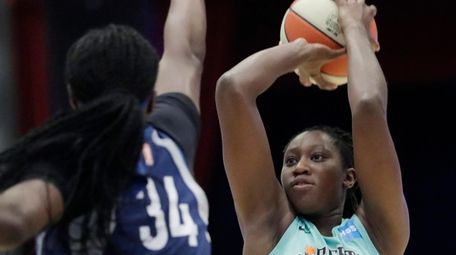 Liberty center Tina Charles shoots as Minnesota Lynx