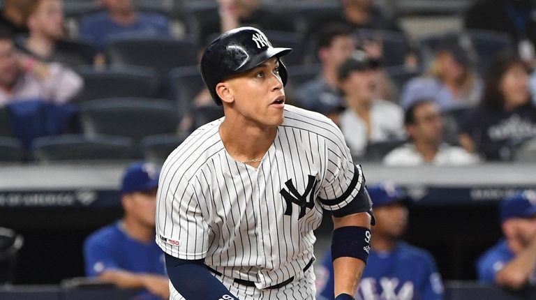 Yankees right fielder Aaron Judge watches the flight