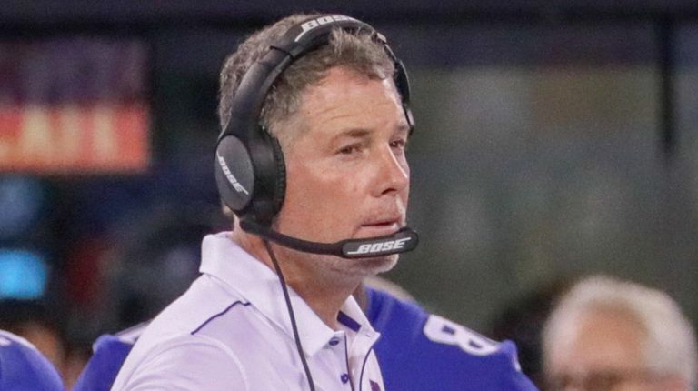 Giants head coach Pat Shurmur looks on from
