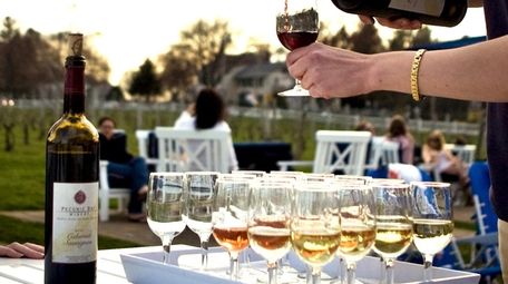 Michelle Rebentisch pours a flight of five different