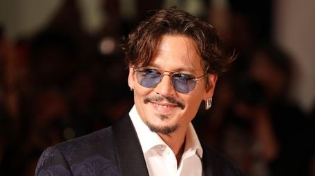 Johnny Depp attends the "Waiting for the Barbarians"