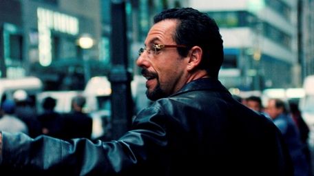 Adam Sandler stars as a charismatic jeweler in