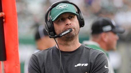 Jets head coach Adam Gase looks at the