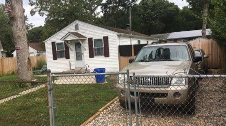 This home in Mastic Beach is listed for