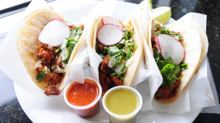 A trio of carnitas tacos at El Paso