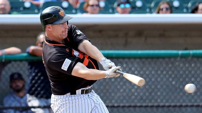 Long Island Ducks' Lew Ford lines a single