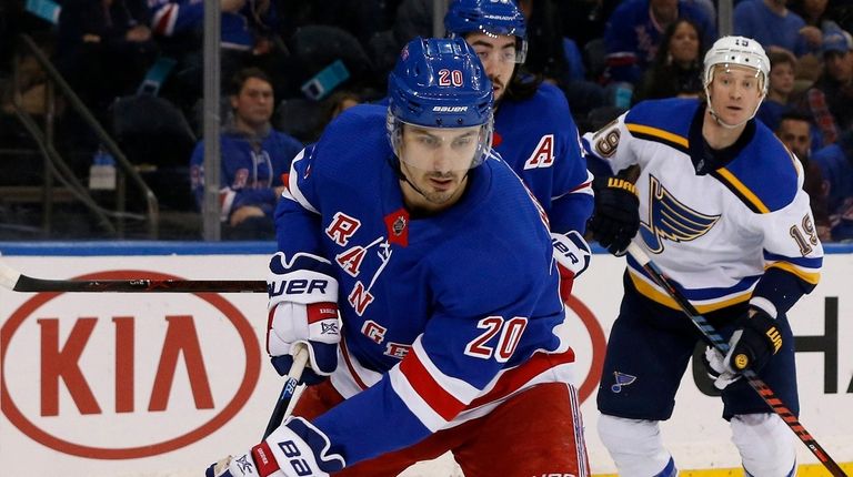 Chris Kreider #20 of the Rangers skates during