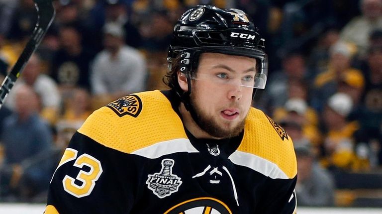 The Bruins' Charlie McAvoy skates during the first