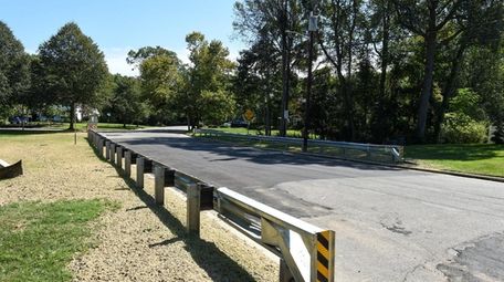 Two highway guardrails, seen on Branch Drive in