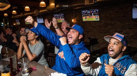 Fans cheer on the Mets at the Parlay