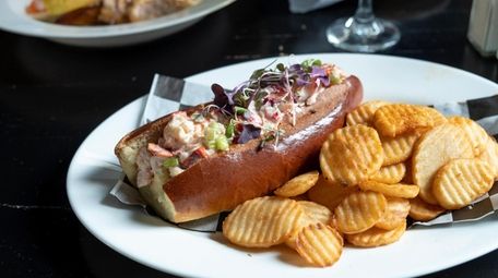 The Lobster roll, served with old bay potato