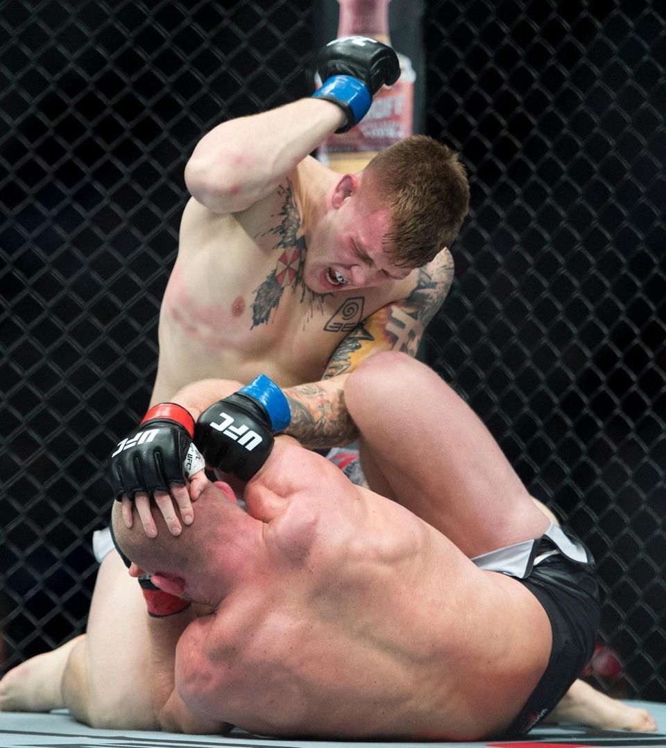 Light Heavyweight fighters Misha Cirkunov, bottom, fights Jimmy