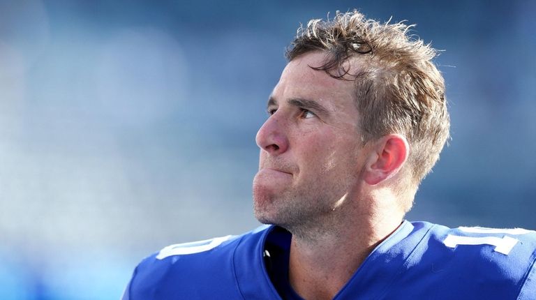 Eli Manning of the New York Giants walks