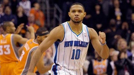 New Orleans Hornets' Eric Gordon reacts after making