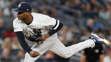 Domingo German of the New York Yankees pitches