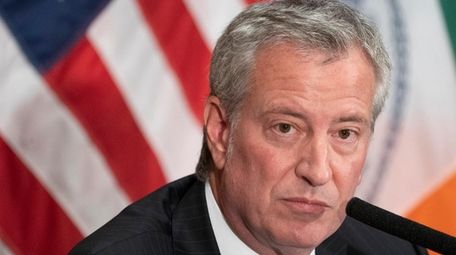 New York City Mayor Bill de Blasio takes