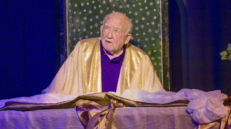 Ed Asner plays the title role in "God