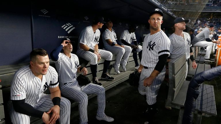 The Yankees wait to take the field for