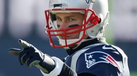 New England Patriots quarterback Tom Brady reacts during